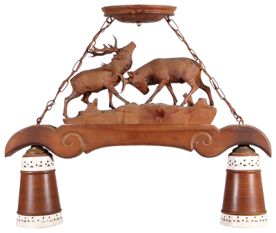 Black Forest ceiling lamp fixture, 26.0" x 21.5",Êlinden wood, two lamps, mid 1900s, was hanging in the bar at Hans' Bavarian Lodge Wheeling, IL,Êcolor photocopy of restaurant brochure included with the lamp, stags have breaks repaired and antler chips, d - 2