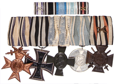 German medal bar, 6.2'' l., with ribbon bar, Bavarian Cross of Military Merit 3rd class; Iron Cross 1914 2nd class; King Ludwig Cross; Bavarian Military Service 9 years 3rd class; Hindenburg Cross, good condition.