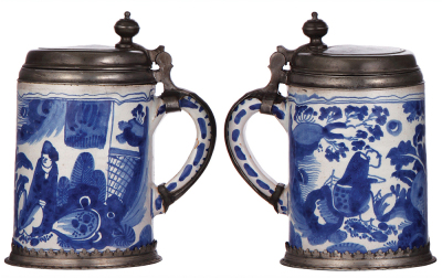 Two Faience steins, 8.2'' ht., mid 1700s, marked: K, Walzenkrug, ribbed body, pewter lid & footring, pewter strap repaired, 1'' hairline & a couple of small rim chips; with, 9.0'' ht., mid 1700s, Walzenkrug, pewter lid & footring, two 1'' hairlines, well - 4