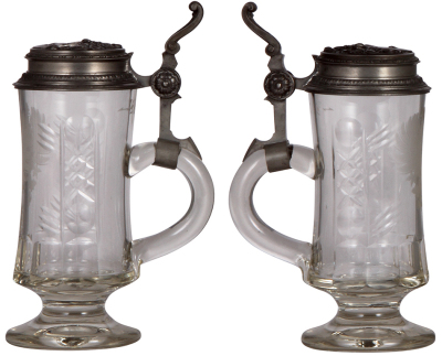 Two glass stein, .5L, blown, pedestal base, wheel-engraved, eagle, relief pewter lid dated 1893, mint; with, .25L, blown, amber, transfer & hand-painted, Munich Child, pewter lid, mint. - 2