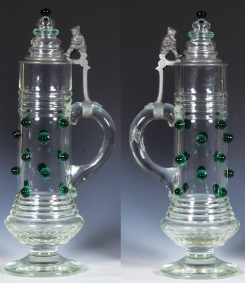 Glass stein & glass pitcher, 15.6" ht., blown, green prunts, matching glass inlaid lid, mint; with, pitcher, 16.0" ht., blown, green, prunts, hand-painted enamel, matching glass inlaid lid, .5" faint line on inlay, otherwise mint. - 2