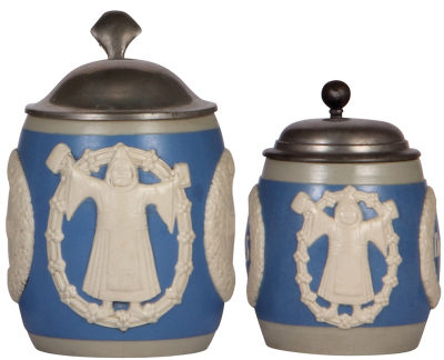 Two Mettlach steins,.5L, 3507 relief, marked Wekara, pewter lid, mint; with, .25L, 3507, relief, marked Wekara, pewter lid, faint 1.0'' hairline, pewter strap repaired.