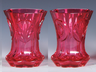 Three glass beakers, 4.4'' to 6.0'' ht., blown, clear, pink cased, wheel-cut & engraved, mint; with, yellow stained, wheel-cut & engraved, Andenken von Swinemünde, light scratches; with, red stained, wheel-cut & engraved, mint. - 2