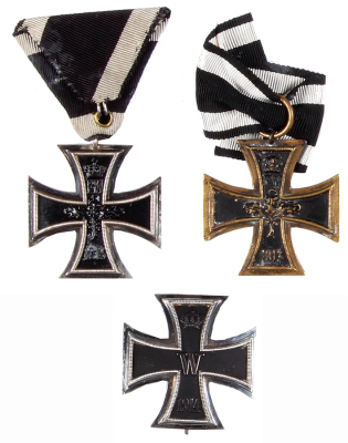 Three Iron Crosses, 1.7” x 1.7”, 1914, First Class, marked 800 [silver], very good condition; 1914, Second Class, with ribbon, good condition; 1914, Second Class, brass, with a loose ribbon, some wear.