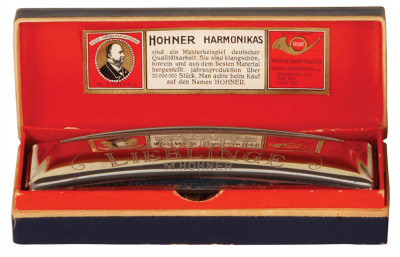 Four assorted items, 8.5" x 7.0", enameled sign, Inft. Regt 29, very good condition; 3.5" d. pin, Prince Henry, discolored; Unsere Lieblinge, M. Hohner Harmonicas, original box, very good condition; Hindenburg Spar-Lampen, with original box, wear to box. - 2