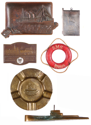 Six assorted ship items, copper ashtray, Norddeutscher Lloyd; copper ashtray, Deutschland; bronze paperweight, U Boot, bronze plaque, Sternfahrt zu den Motorsporttagen Hamburg, 1928; silver-plated note holder, Hamburg Amerika Linie; mini-life preserver, S