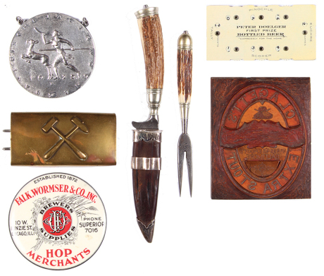 Seven assorted items, printer's mold: Clagett's Ettra Stout; mirror Hop Merchant's; Peter Doelger Bottled Beer Baseball score counter; brass belt buckle; Bayer. Jäger Woche 1925 medallion; knife & fork, horn handles, good used condition.